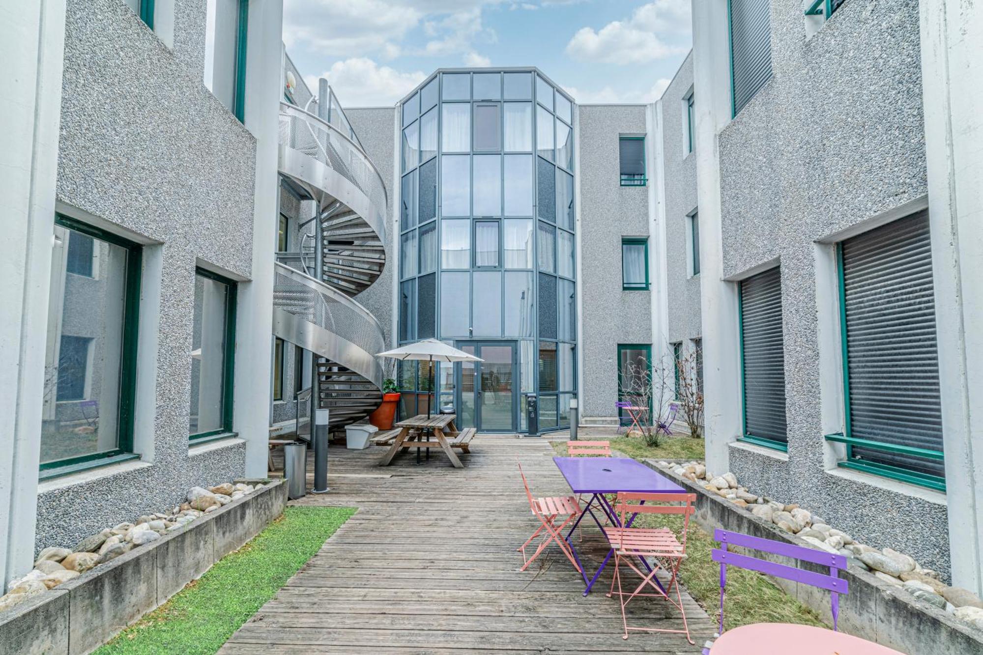 Montempo Apparthotel Lyon Viviani Венисьё Экстерьер фото